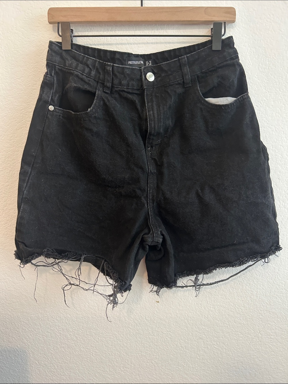 Prettylittlething Black Distressed Shorts